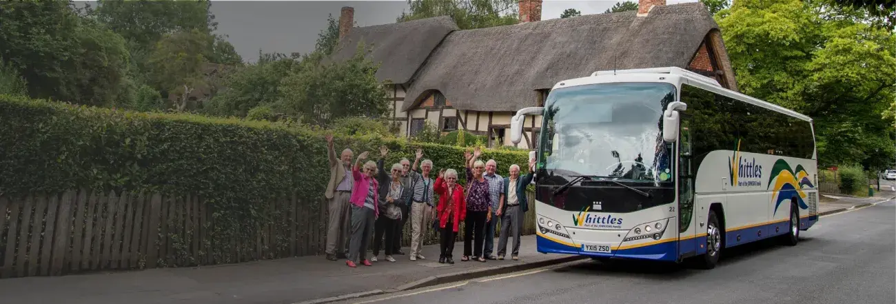 Whittles coach with people