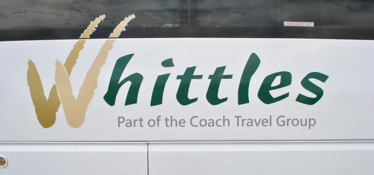 Whittles Logo on Coach